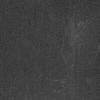 struttura di nero Opaco plastica. nero sfondo è ruvido plastica. foto