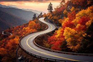 ai generato un' avvolgimento montagna strada con strati di vivace autunno colori. generativo ai foto