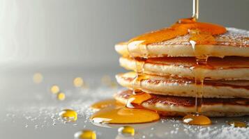 ai generato pila di Pancakes coperto nel sciroppo foto