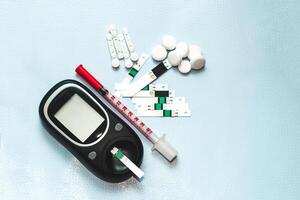 un' aggeggio per misurazione sangue zucchero per diabetici. foto