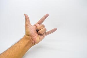 metallo mano gesto isolato su bianca sfondo foto