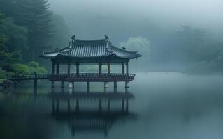ai generato nebbioso in riva al lago pagoda foto