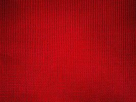 rosso a maglia tessuto macro foto come un' sfondo.