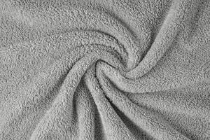spugna stoffa, grigio asciugamano struttura sfondo. morbido soffice tessile bagno o spiaggia asciugamano Materiale foto