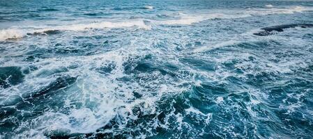 vivido blu oceano onde struttura sfondo foto