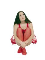 giovane donna nel rosso danza attrezzatura guardare su foto