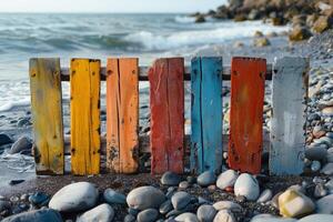 ai generato colorato di legno tavole su il spiaggia di il mare foto