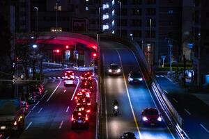 un' notte traffico marmellata a yamate viale nel tokyo lungo tiro foto