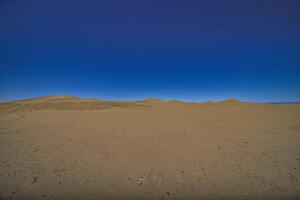 un' panoramico sabbia duna di sahara deserto a mhamid EL ghizlane nel Marocco largo tiro foto