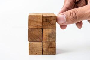 ai generato mano con di legno cubi isolato su bianca sfondo foto