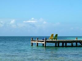 belize Cayes - piccolo tropicale isola a barriera scogliera con Paradiso spiaggia - conosciuto per immersione, lo snorkeling e rilassante vacanze - caraibico mare, Belize, centrale America foto