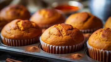 ai generato avvicinamento di al gusto di zucca muffin fresco su di il forno. generativo ai foto