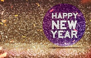 felice anno nuovo su cerchio viola in glitter astratti color oro foto