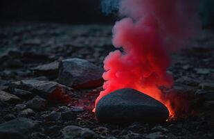 ai generato nel un' buio e misterioso ambientazione, un' pietra emette un' vivace rosso Fumo foto