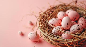 ai generato pastello rosa tratteggiata Pasqua uova nel di vimini cestino piace uccello nido su solido leggero rosa colore sfondo con copia spazio. saluto carta per Pasqua vacanze. foto