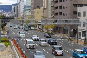 un' traffico marmellata a il grande viale nel kyoto foto