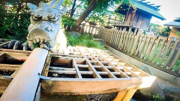 acqua Dio, Drago Dio di chozuya, santuario nel Shinjuku, tokyo, Giappone - itsukushima santuario nukibenten nukibenten è adesso un' posto nome, ma esso si riferisce per itsukushima santuario, dove minamoto no yoshiie una volta foto