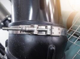 uso di inossidabile acciaio t bullone morsetti nel gomma da cancellare tubo flessibile tubo connessioni. foto