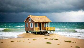 miniatura scena di minuscolo Casa di sabbia spiaggia isola, foto