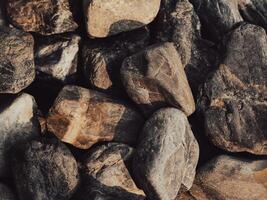 avvicinamento di Marrone rocce, forte naturale superficie foto