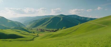 panorama di bellissimo campagna. meraviglioso primavera paesaggio nel montagne. erboso campo e rotolamento colline. rurale scenario foto