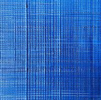 un' blu e bianca a strisce tessuto con un' blu sfondo foto
