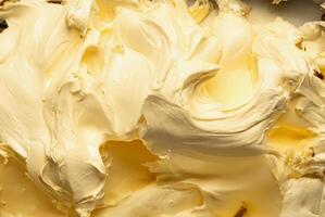 vicino su, pieno telaio dettaglio di sontuoso vaniglia gusto gelato, liscio beige struttura. foto