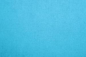 sereno leggero blu cotone tessuto struttura, naturale tessile modello. foto