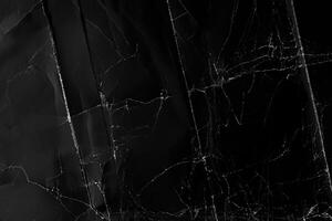 lunatico carta struttura su buio sfondo. foto