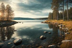 un' lago circondato di alberi e erba foto