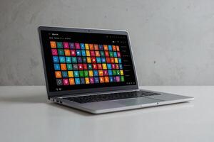 un' il computer portatile con molti diverso icone su esso foto