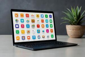 il computer portatile con icone su schermo foto