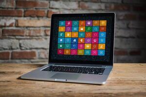 un' il computer portatile con molti colorato App icone In arrivo su di esso foto