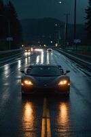 un' gli sport auto guida giù un' bagnato strada a notte foto
