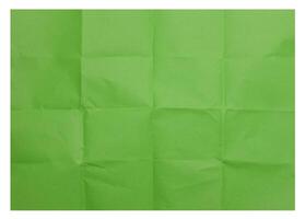 verde piegato foglio di carta su isolato sfondo foto