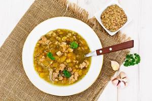 zuppa di lenticchie con carne macinata, sedano rapa, zucca, cipolla foto