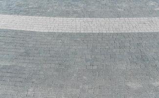 il struttura di un' piastrelle marciapiede con prospettiva. foto