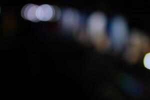 sfondo fotografia. strutturato sfondo. astratto sfocato sfocato sfondi di scintillante leggero a notte. scintillante luci su un' buio sfondo. bandung, Indonesia foto