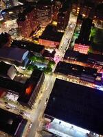 aereo notte Visualizza di illuminato centrale Manchester città e centro edifici, Inghilterra unito regno. Maggio 4°, 2024 foto