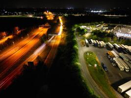 aereo Visualizza di illuminato centrale Dartford Londra città di Inghilterra durante notte. Inghilterra UK. aprile 14, 2024 foto