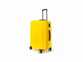 valigia gialla o bagaglio giallo per viaggiare su sfondo bianco.