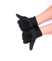 nero stoffa palma guanti con anti scivolo presa, isolato su bianca sfondo. foto
