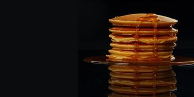 delizioso Pancakes con miele foto