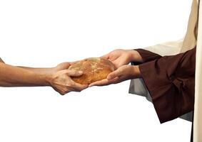 Gesù dà il pane per un' mendicante. foto