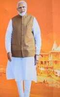 nuovo delhi, India - febbraio 17 2024 - primo ministro narendra modi tagliare su durante bjp strada mostrare, il manifesto di pm modi mentre frequentando un' grande elezione rally nel il capitale foto