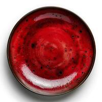 rosso ceramica piatto isolato su bianca sfondo con ombra. rosso piatto con struttura superiore Visualizza foto