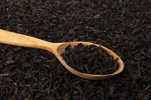 asciutto tè le foglie sfondo o struttura, nero tè modello foto
