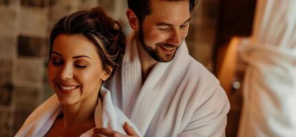 un' sposini coppia coccolato su nel felpa Vestiti dopo loro infrarosso sauna sessione crogiolarsi nel il sensazione di rilassamento e benessere dotato per loro. foto