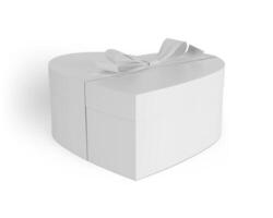 scatola regalo a forma di cuore su sfondo bianco foto