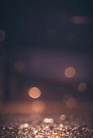 un' sfocato Immagine di un' strada a notte con luci foto